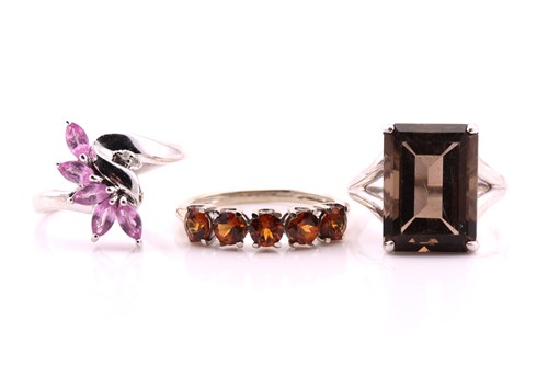 Lot 817 - A single stone smoky quartz ring in 9 carat...