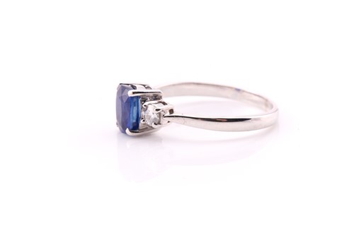 Lot 847 - A sapphire and diamond three stone half hoop...