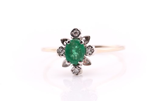 Lot 811 - An emerald and diamond ring; the central oval...