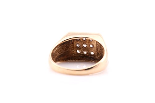 Lot 580 - A square pavé set ring; the nine clear stones...