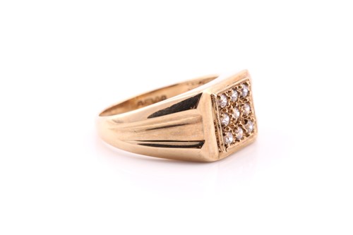Lot 580 - A square pavé set ring; the nine clear stones...