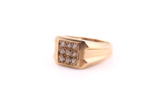 Lot 580 - A square pavé set ring; the nine clear stones...