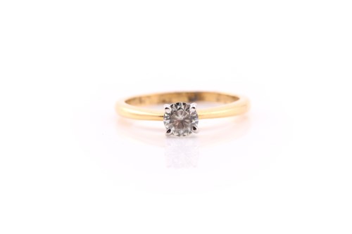 Lot 568 - A single stone diamond ring; the round...