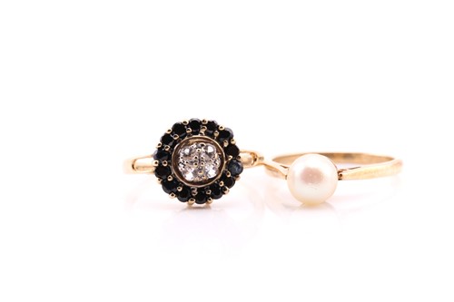 Lot 790 - A single stone cultured pearl ring; in 9 carat...