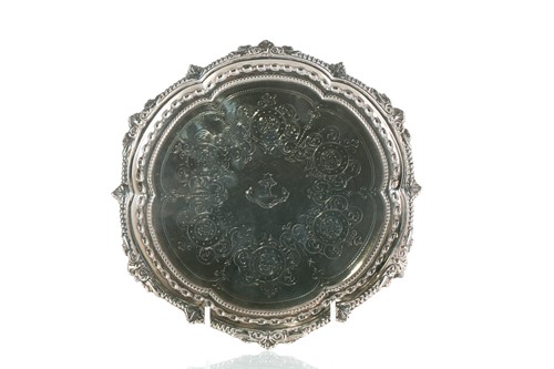 Lot 336 - A silver salver, the centre engraved with a...