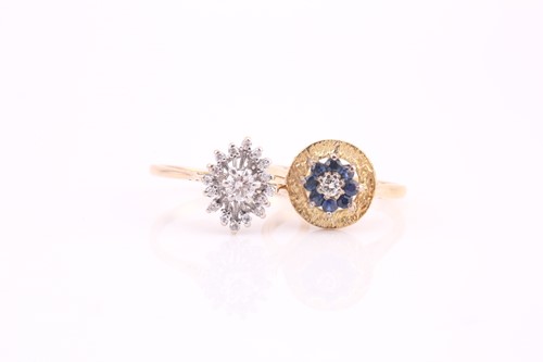 Lot 617 - A sapphire and diamond cluster ring, the nine...