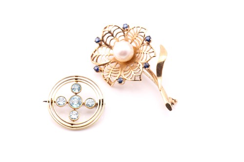 Lot 759 - A pearl and sapphire flower brooch, the...