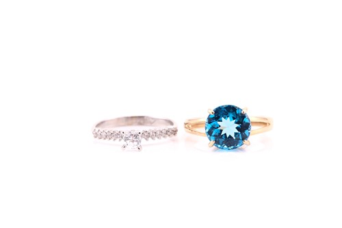 Lot 656 - A single stone blue topaz cocktail ring; the...