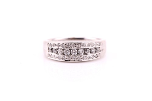 Lot 724 - A three row diamond ring; the graduated bands...