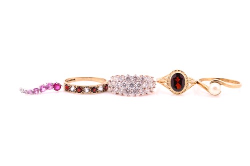 Lot 723 - A seven stone pink sapphire pendant; the...