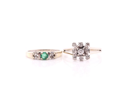 Lot 172 - A nine stone diamond cluster ring; the open...