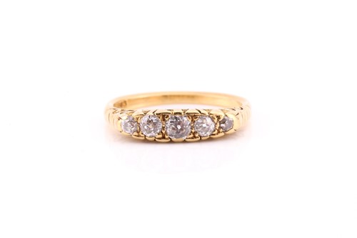 Lot 846 - A five stone half hoop diamond ring; the...