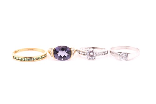 Lot 689 - Two cubia zirconia single stone rings in 9...