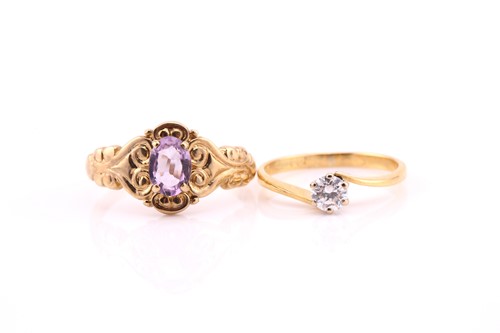 Lot 818 - A single stone diamond ring; the round...