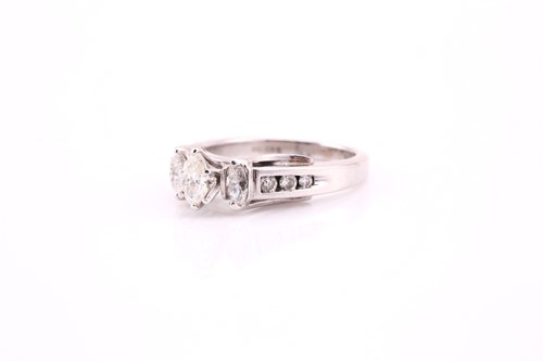 Lot 6 - A thee stone half hoop diamond ring, the...
