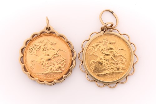 Lot 857 - A sovereign dated 2000, in scalloped 9 carat...
