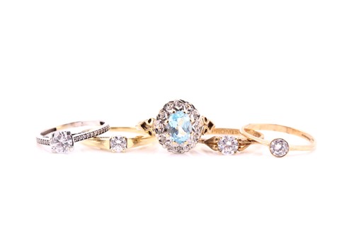 Lot 738 - A blue topaz and diamond oval cluster ring;...