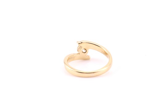 Lot 830 - A single stone diamond ring; the round...