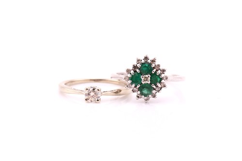 Lot 611 - An emerald and diamond cluster ring; the five...