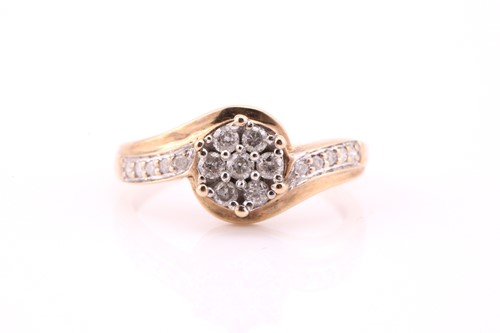 Lot 531 - A diamond cluster ring; the seven stone...