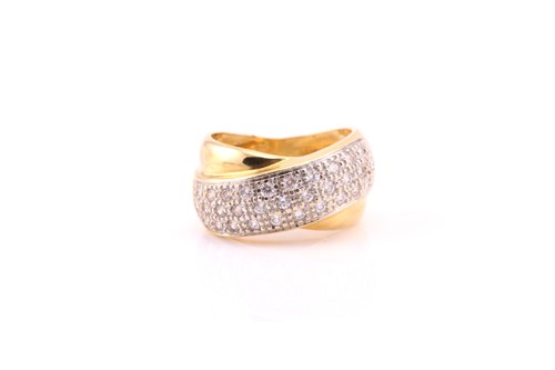 Lot 855 - A cubic zirconia, pavé set, crossover ring; in...