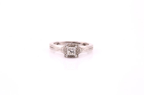 Lot 459 - A diamond cluster ring; the princess cut...