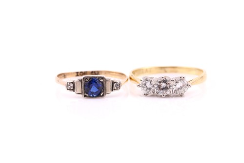 Lot 660 - A three stone half hoop diamond ring, the...