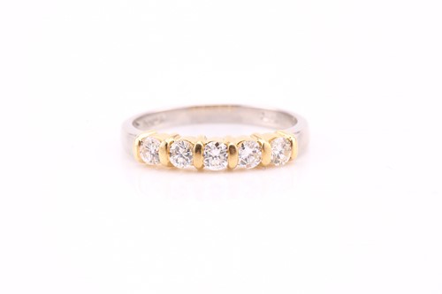 Lot 850 - A diamond five-stone half hoop ring; the round...