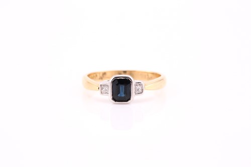 Lot 815 - A sapphire and diamond half hoop ring, the...