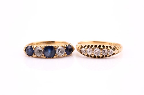 Lot 687 - A five stone sapphire and clear stone half...