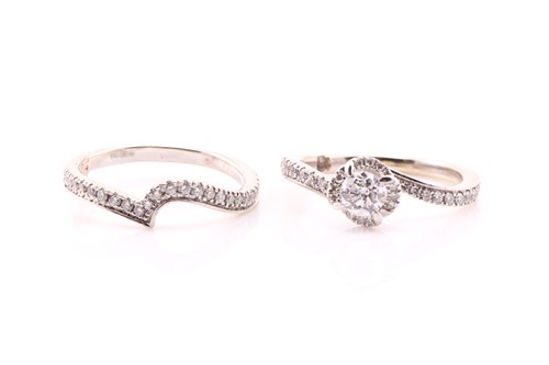 Lot 615 - A diamond bridal set comprising a diamond...