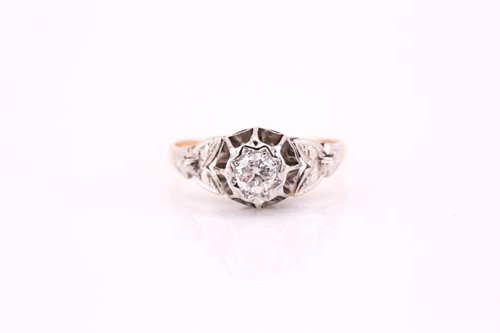 Lot 710 - A single stone diamond ring; the round...