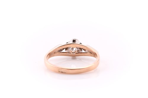 Lot 9 - A single stone diamond ring; the round...