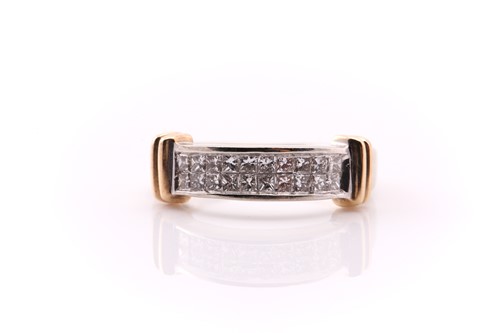 Lot 777 - A two-row half hoop diamond ring; comprising...