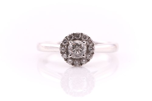 Lot 31 - A diamond cluster ring; the principal modified...