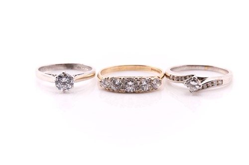 Lot 634 - A single stone diamond ring; the modified...