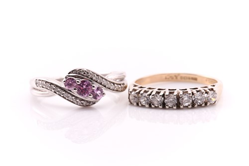 Lot 255 - A three stone pink sapphire and diamond...