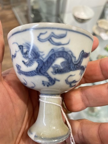 Lot 201 - A pair of Chinese blue & white stem cups, Ming...