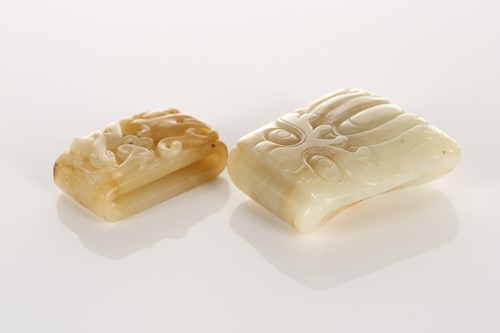Lot 130 - A Chinese jade sword fitting, of rectangular...
