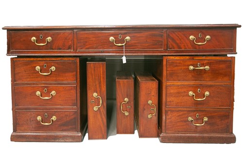 Lot 300 - A mahogany kneehole partners desk, George IV,...