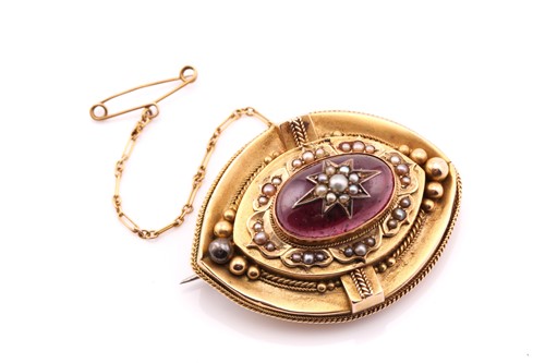 Lot 36 - A Victorian garnet and pearl mourning brooch;...