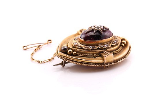 Lot 36 - A Victorian garnet and pearl mourning brooch;...