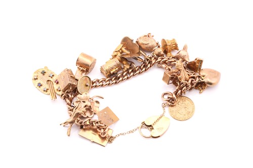 Lot 221 - A 9 carat yellow gold curb link charm bracelet...