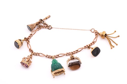 Lot 163 - A 9ct fancy curb link charm bracelet, the...