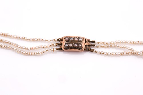 Lot 50 - A 19th century three-strand seed pearl...
