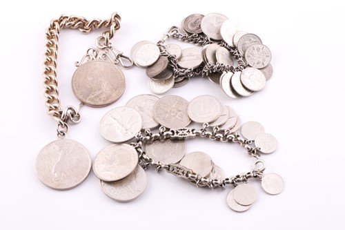 Lot 126 - A lot consisting of three coin charm bracelets,...