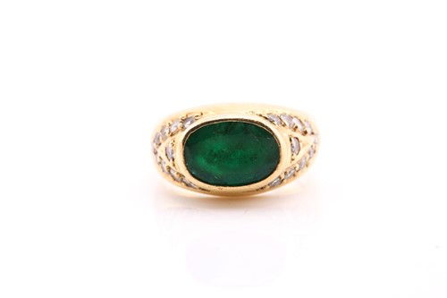 Lot 78 - An emerald and diamond ring, in yellow metal...