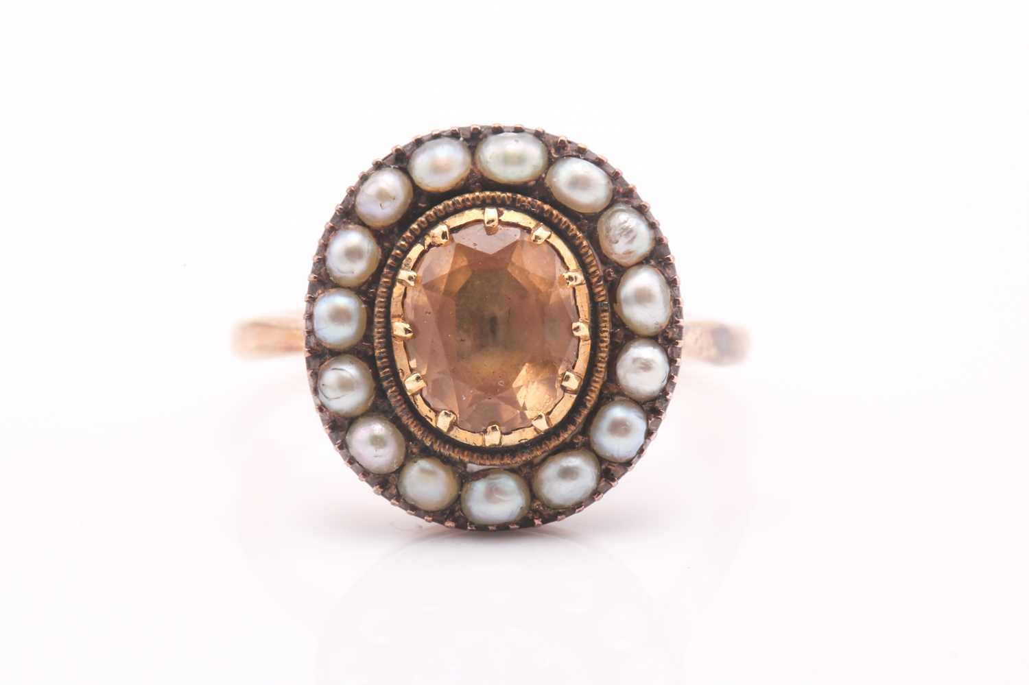 Lot 137 - Early 19th-century brown topaz and seed pearl...