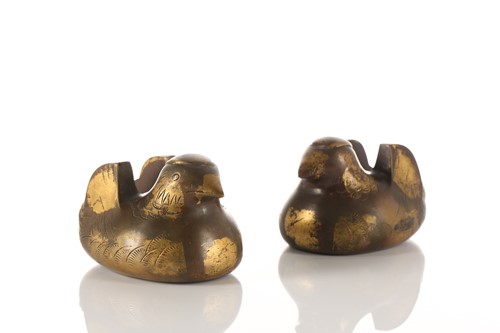 Lot 109 - A pair of Japanese patinated bronze byobu...