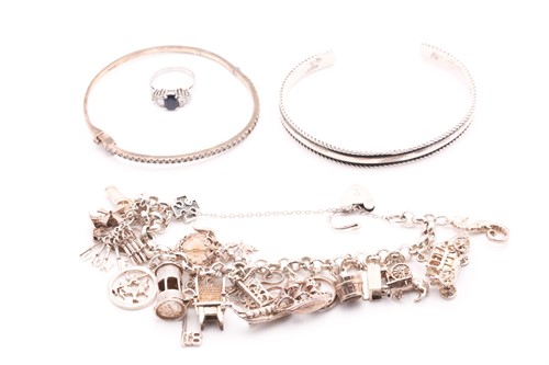 Lot 100 - A silver belcher link charm bracelet, a white...